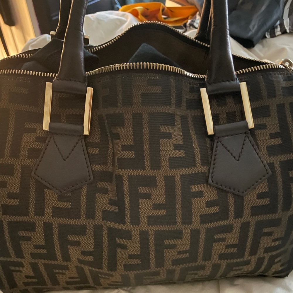 Authentic Fendi Zucca “Tobacco” Boston Bag with Matching Wallet.